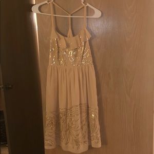 Midi dress. Gold flower sequin on top and bottom.
